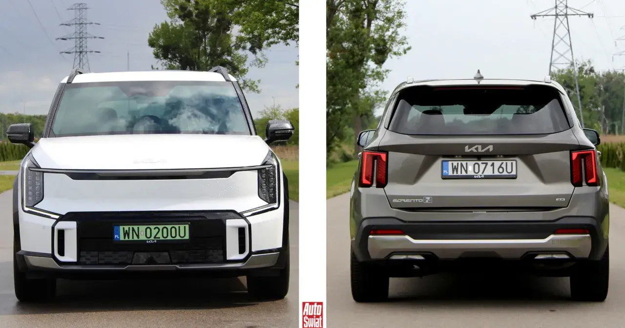 Biała Kia EV9 z przodu i szara Kia Sorento z tyłu, obie na drodze.