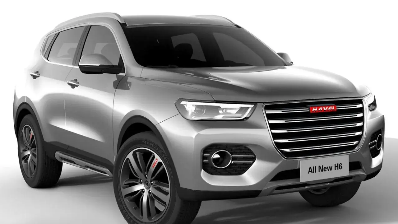 Srebrny SUV Haval H6 z nowoczesnym grillem i światłami LED.