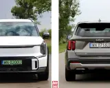 Biała Kia EV9 z przodu i szara Kia Sorento z tyłu, obie na drodze.