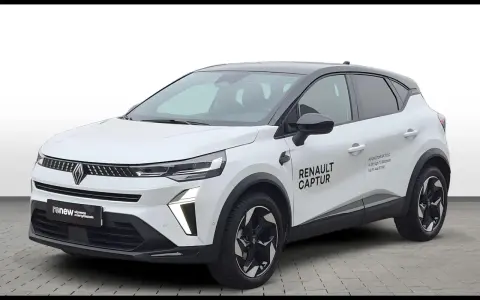 Biały, używany Renault Captur z salonu, gotowy na nowe przygody. Idealny do miasta i na dalsze trasy.