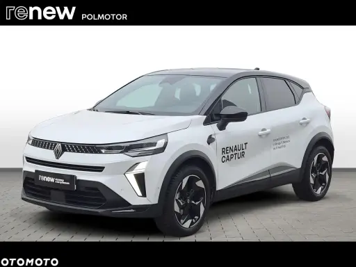 Biały, używany Renault Captur z salonu, gotowy na nowe przygody. Idealny do miasta i na dalsze trasy.