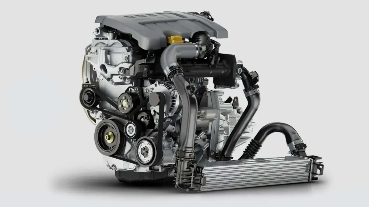 Silnik samochodowy 1.2 tce z turbosprężarką i intercoolerem, prezentujący złożoną konstrukcję i nowoczesną technologię.