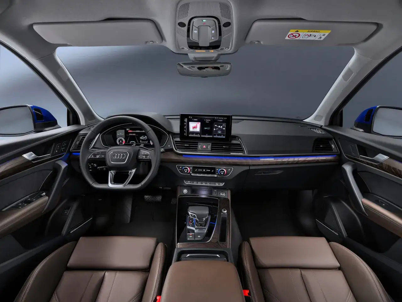 Wnętrze Audi Q5 2025: skórzane fotele, cyfrowy kokpit i nowoczesny design.