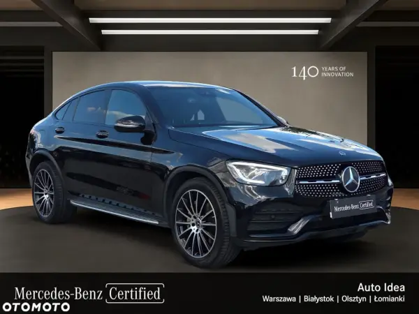 Elegancki, czarny Mercedes GLC używany z salonu, z napisem "140 Years of Innovation" i logo "Mercedes-Benz Certified".